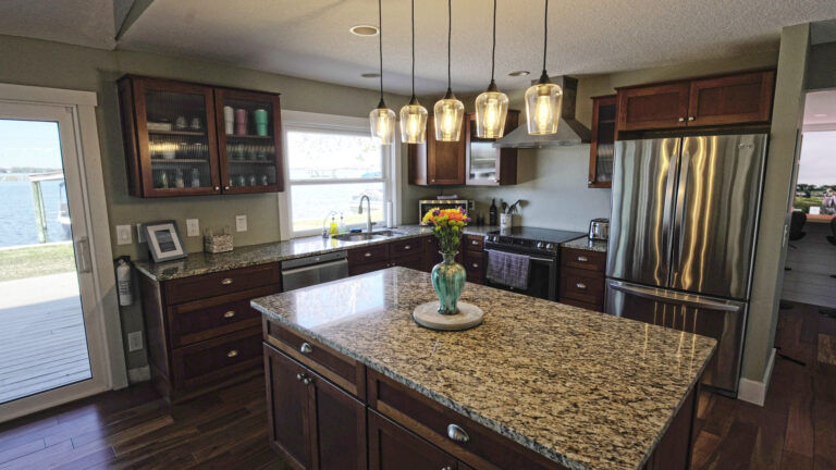 Full kitchen with a lakeview over the sink