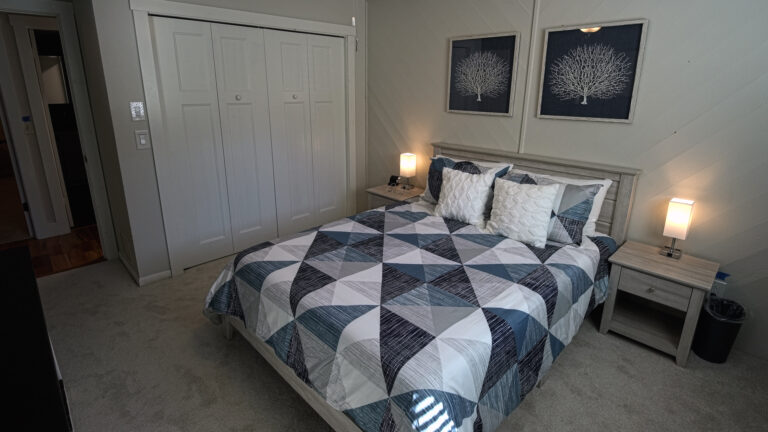 Queen bed in bedroom 2